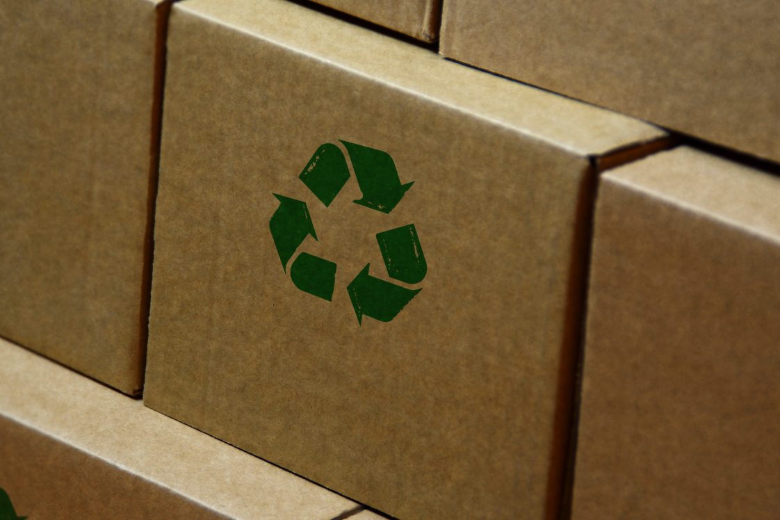cardboard box with recycling symbol on it