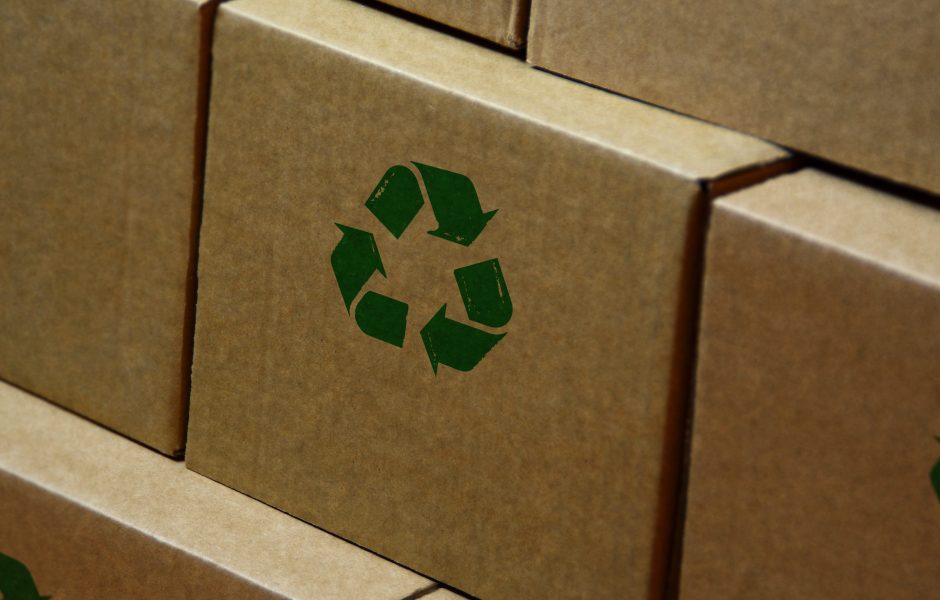 cardboard box with recycling symbol on it