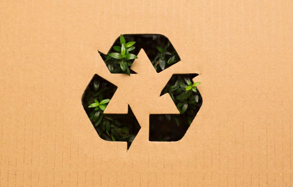 box with plants and recycling symbol on it