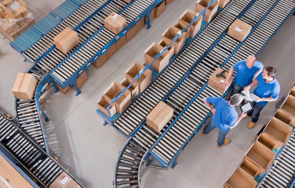 boxes moving on conveyor belt in ecommerce fulfillment center