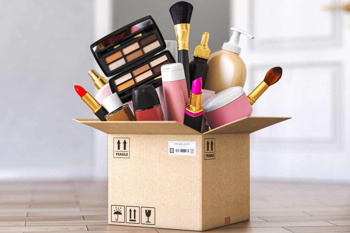 cardboard box filled to the brim with cosmetic products