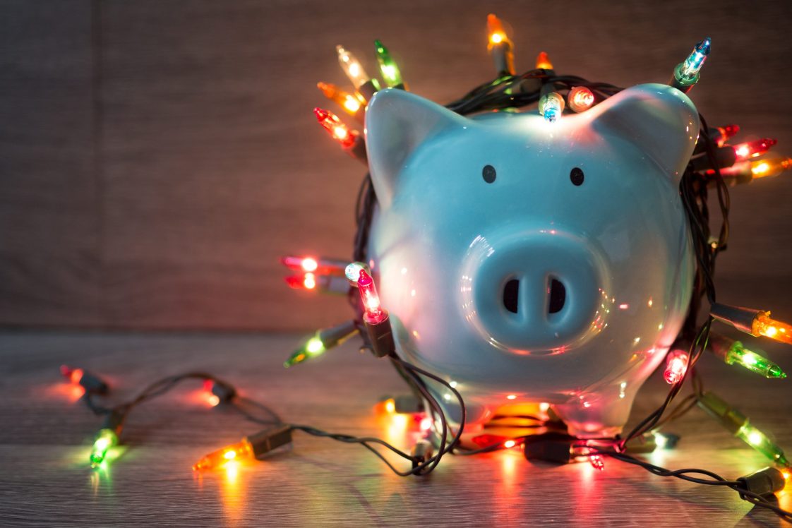 piggy bank covered in christmas lights