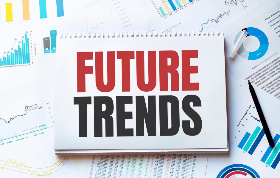 graphs and charts with paper that says future trends