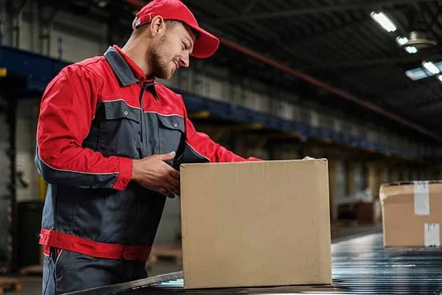 man loading box in warehouse