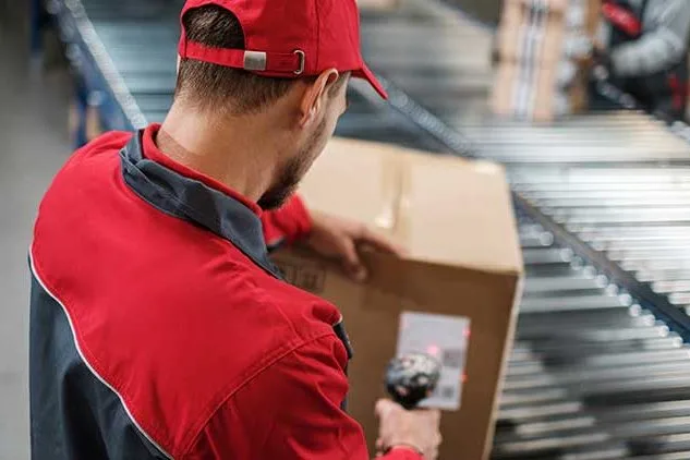 man scanning box