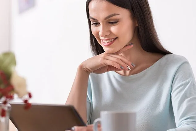 woman shopping on tablet