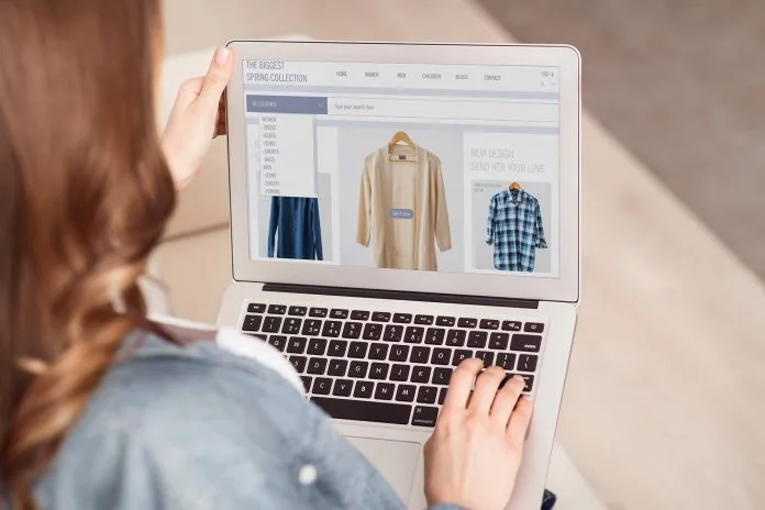Woman using laptop to shop online