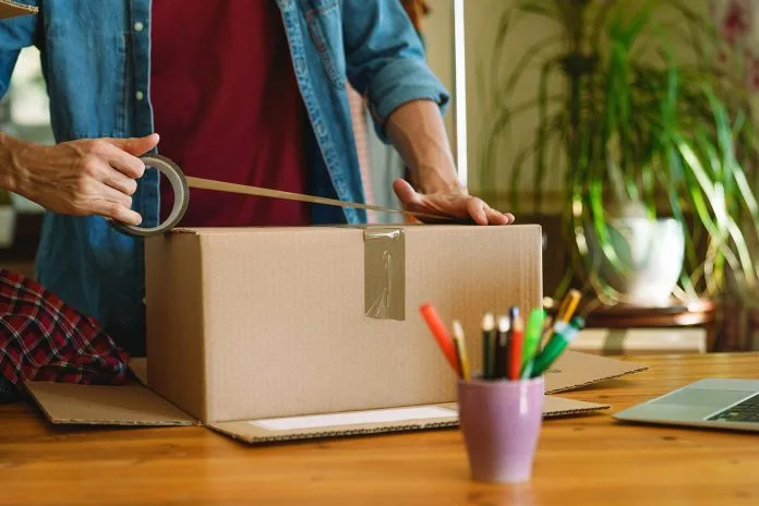 Man returning parcel